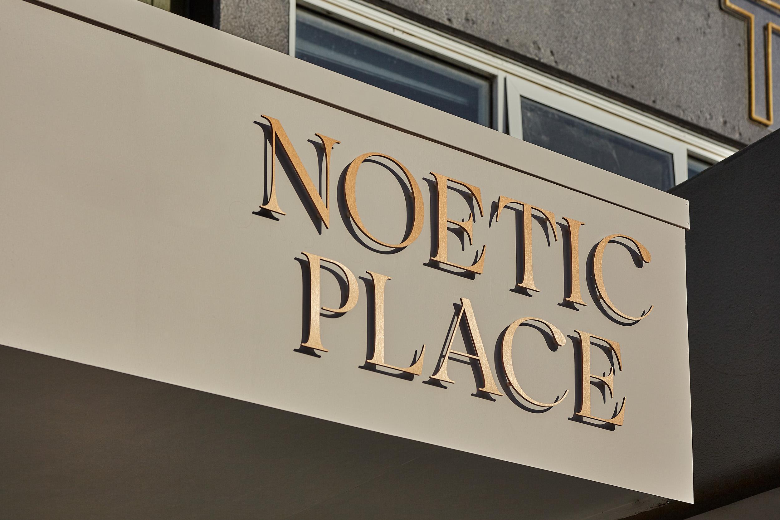 Noetic Place display suite signage by Seesaw Studio