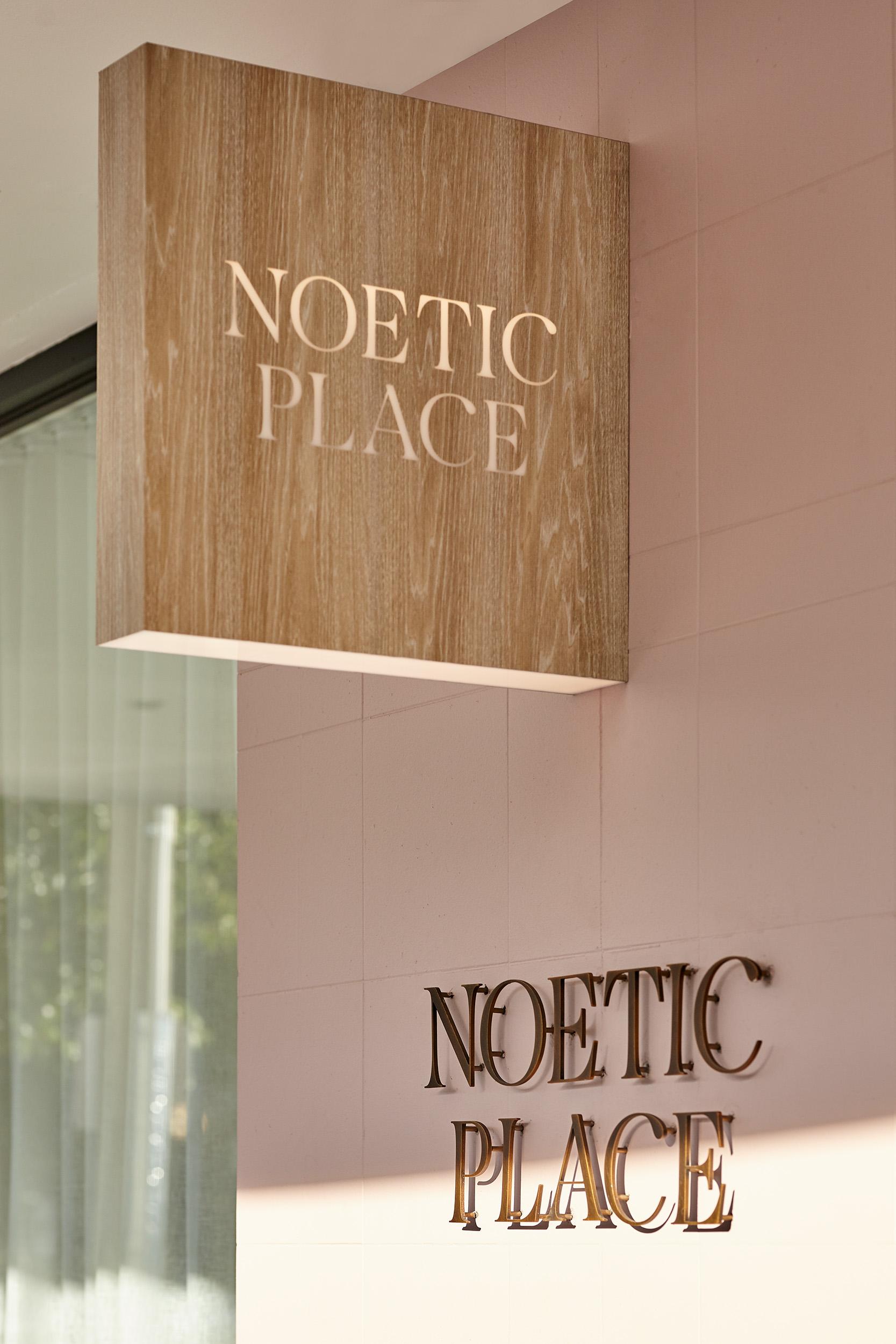 Noetic Place display suite signage by Seesaw Studio